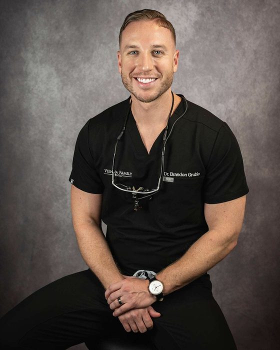 Dr. Brandon Grubic in black scrubs