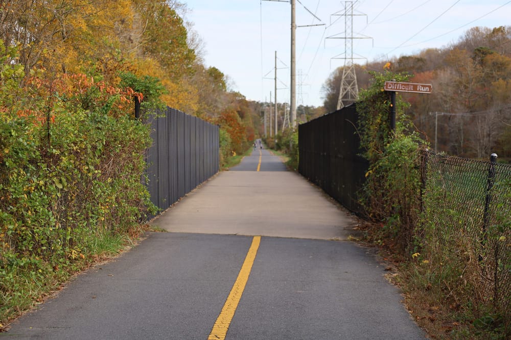 The W&OD Trail between autumn trees